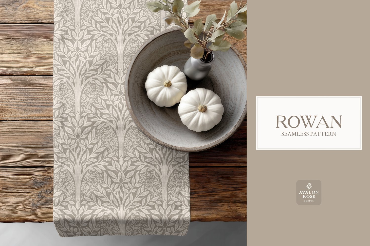 Hand drawn seamless pattern featuring woodland trees and leaves in beige on a tea towel next to a bowl of pumpkins