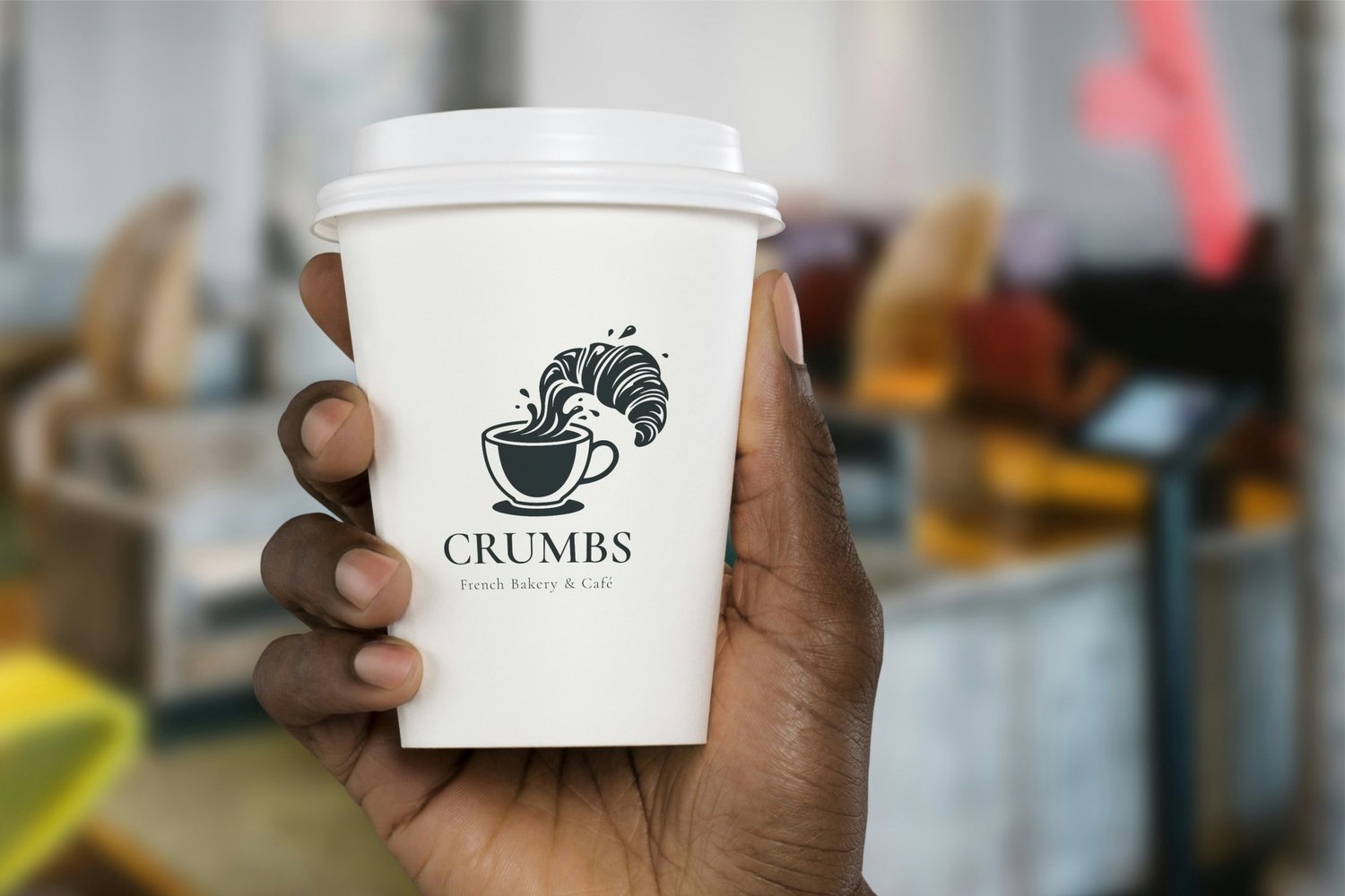 Takeaway paper coffee cup mockup held in hand