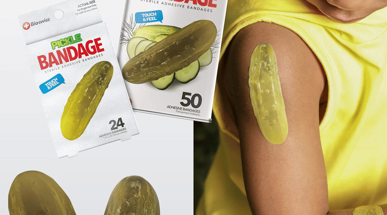 Pickle-shaped adhesive bandages shown on the package and applied to an arm
