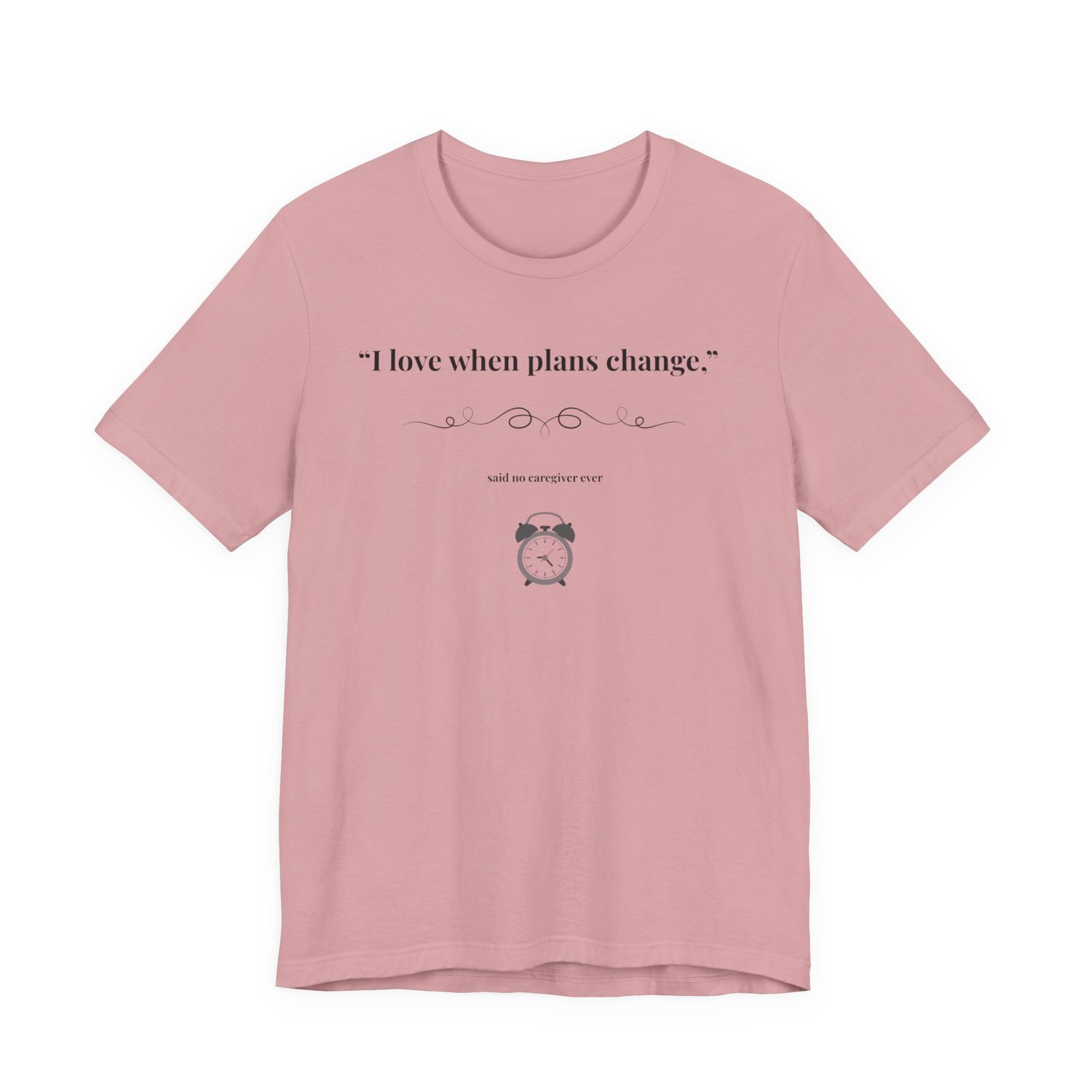 Orchid shirt flat lay – “I Love When Plans Change” caregiver design