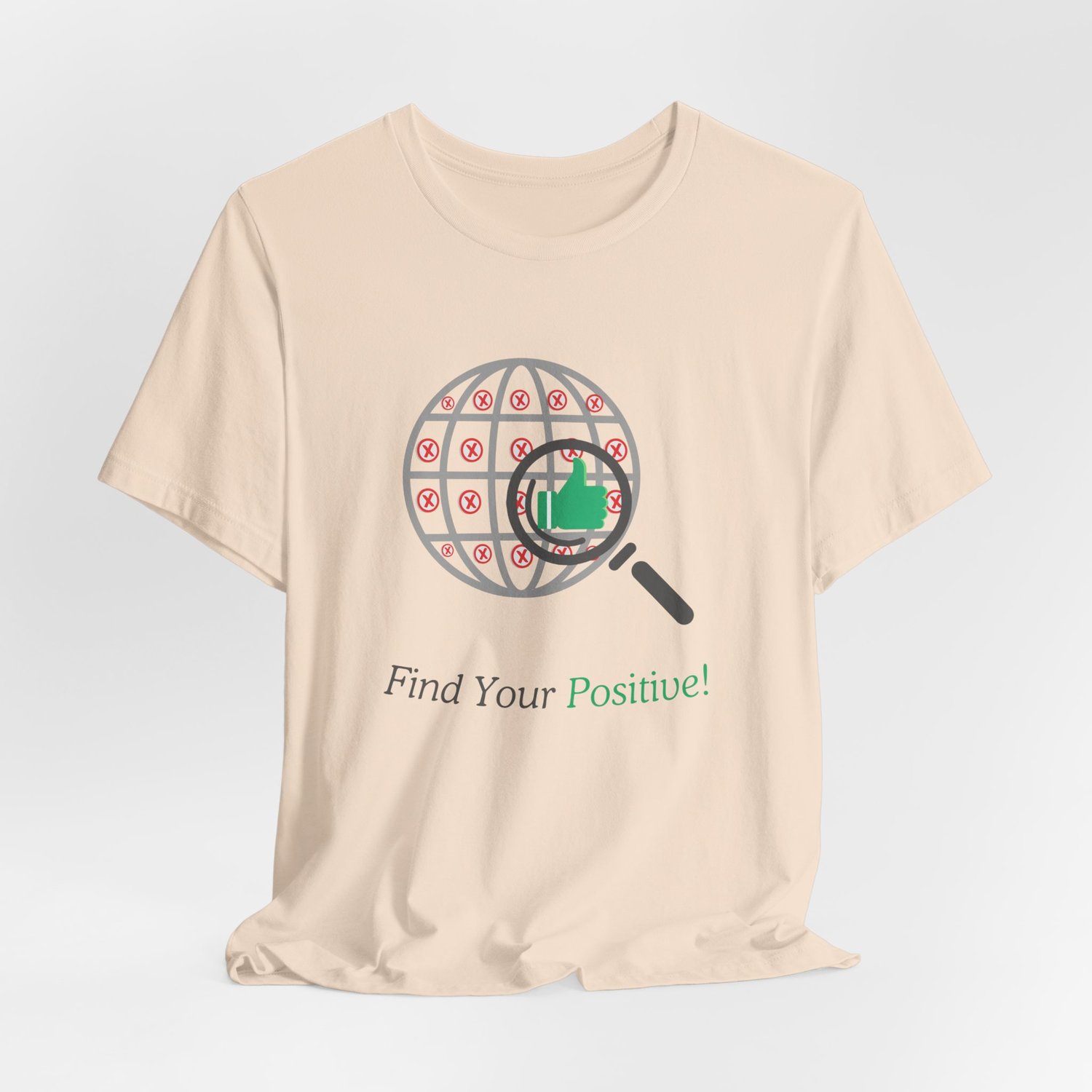 Wrinkled flat-lay of the ‘Find Your Positive’ shirt highlighting the graphic on soft fabric.