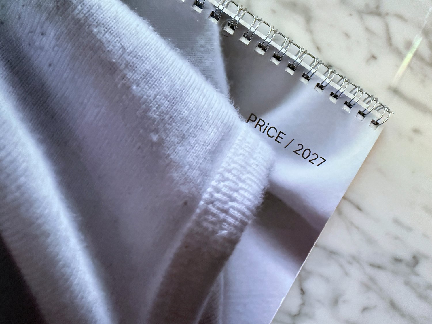 PRiCE / 2027 physical photography calendar photographed on marble