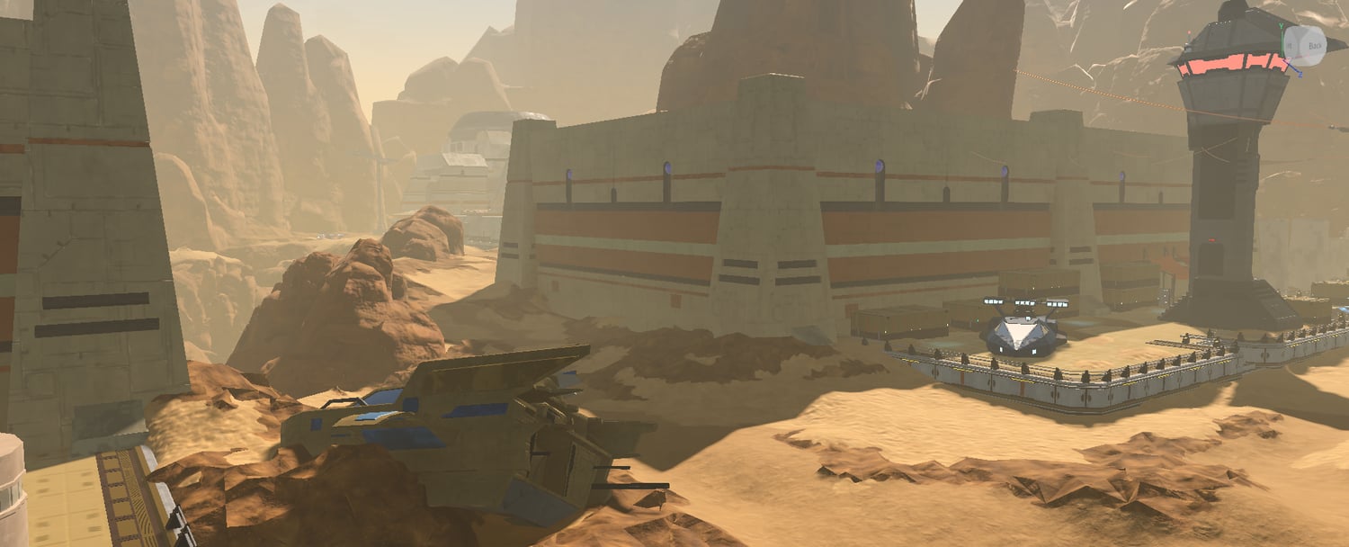Futuristic desert buildings and cliffs