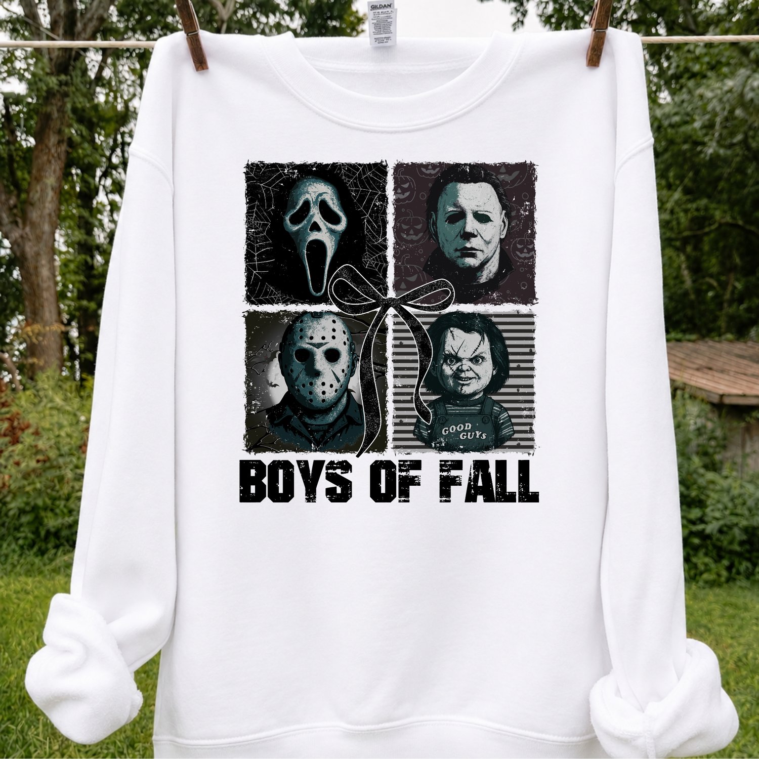 Main Image: White Gildan Boys of Fall sweatshirt featuring Ghostface, Michael Myers, Jason, and Chucky in a four-panel grid with a bow motif.