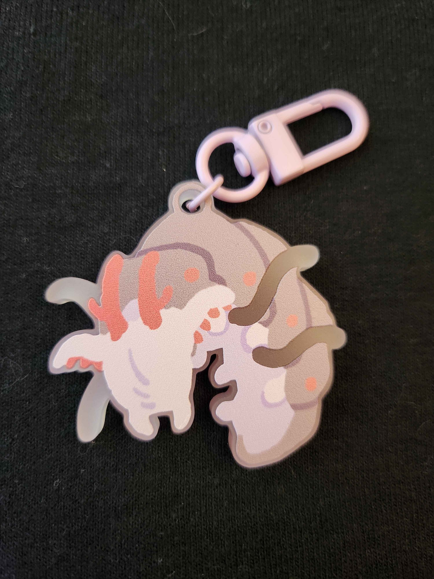 a close up photograph of the acrylic charm