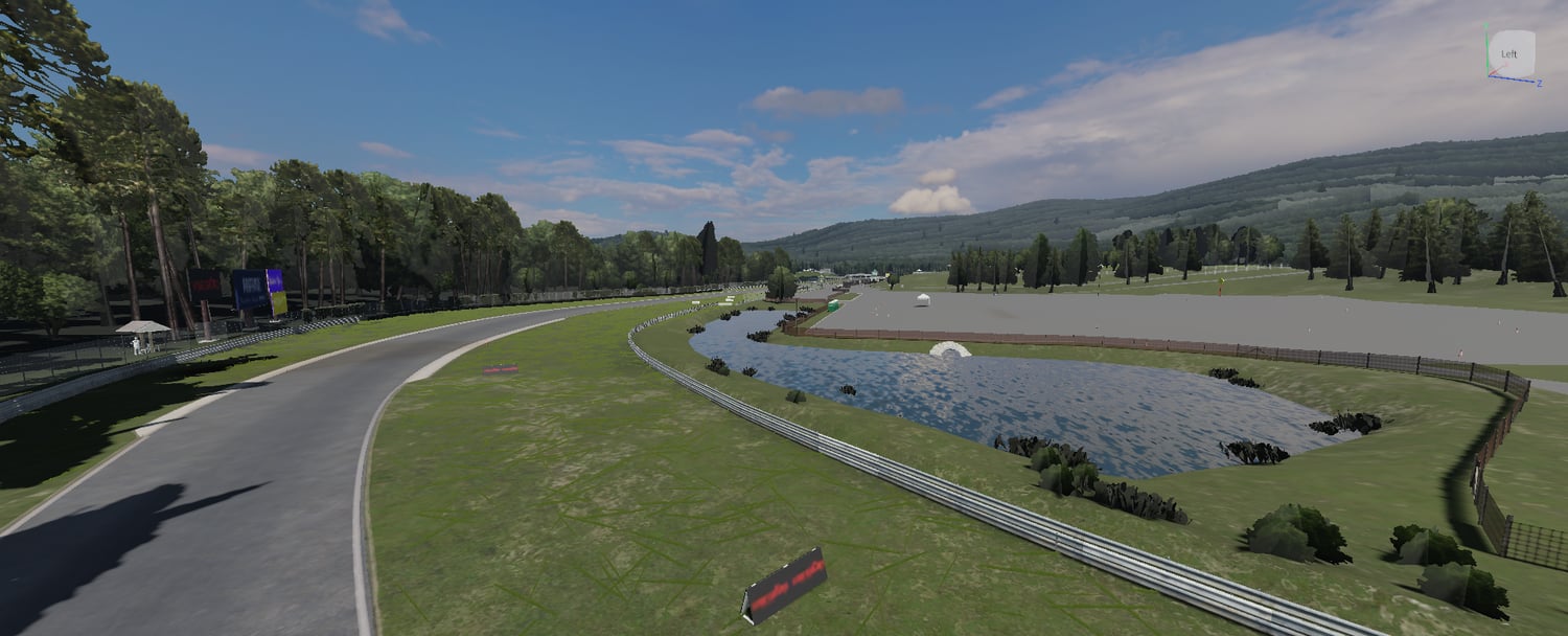 Race track bend with grassy runoff areas