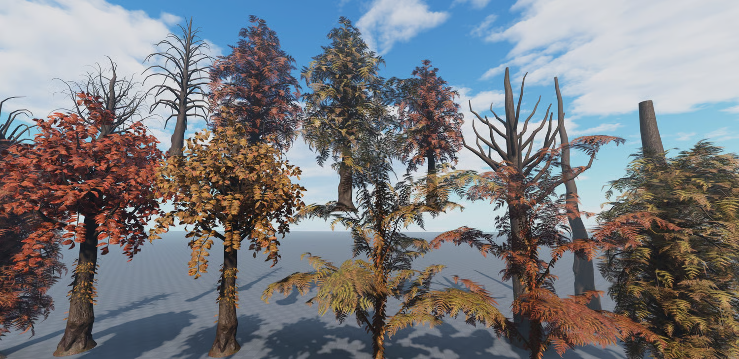 Deciduous trees with red yellow and brown leaves