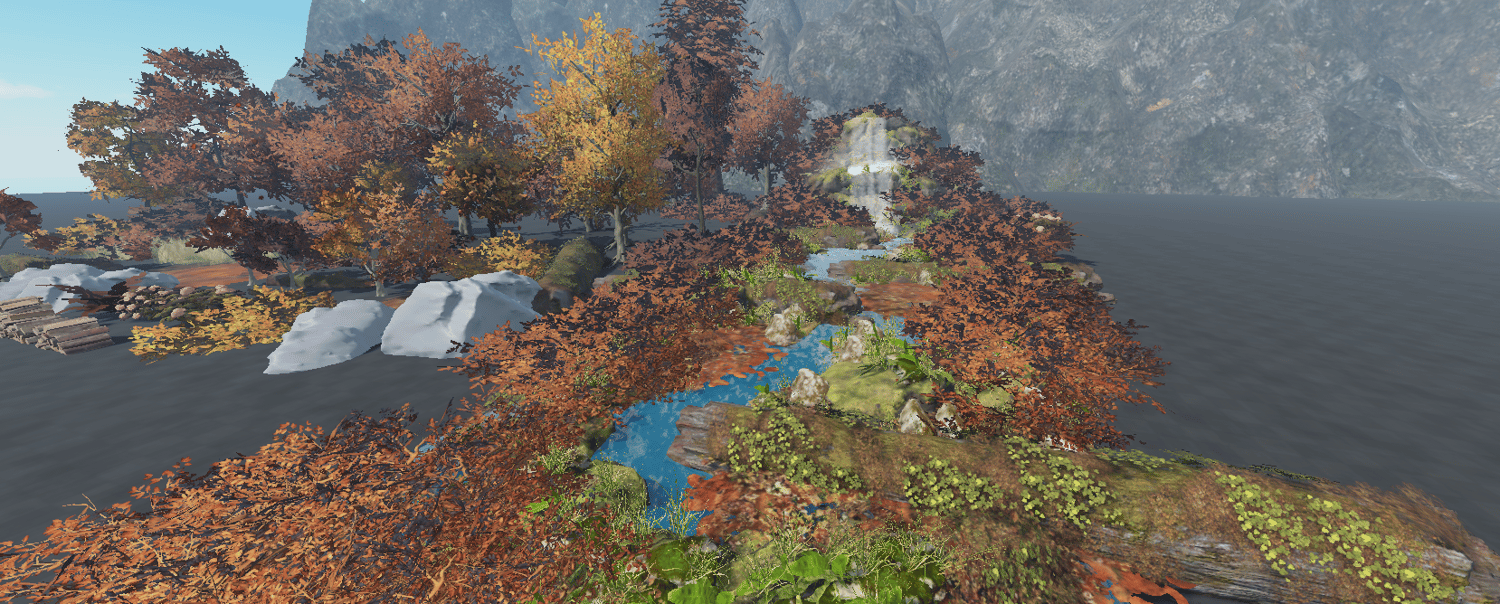 Golden autumn trees surrounded by colorful woodland foliage