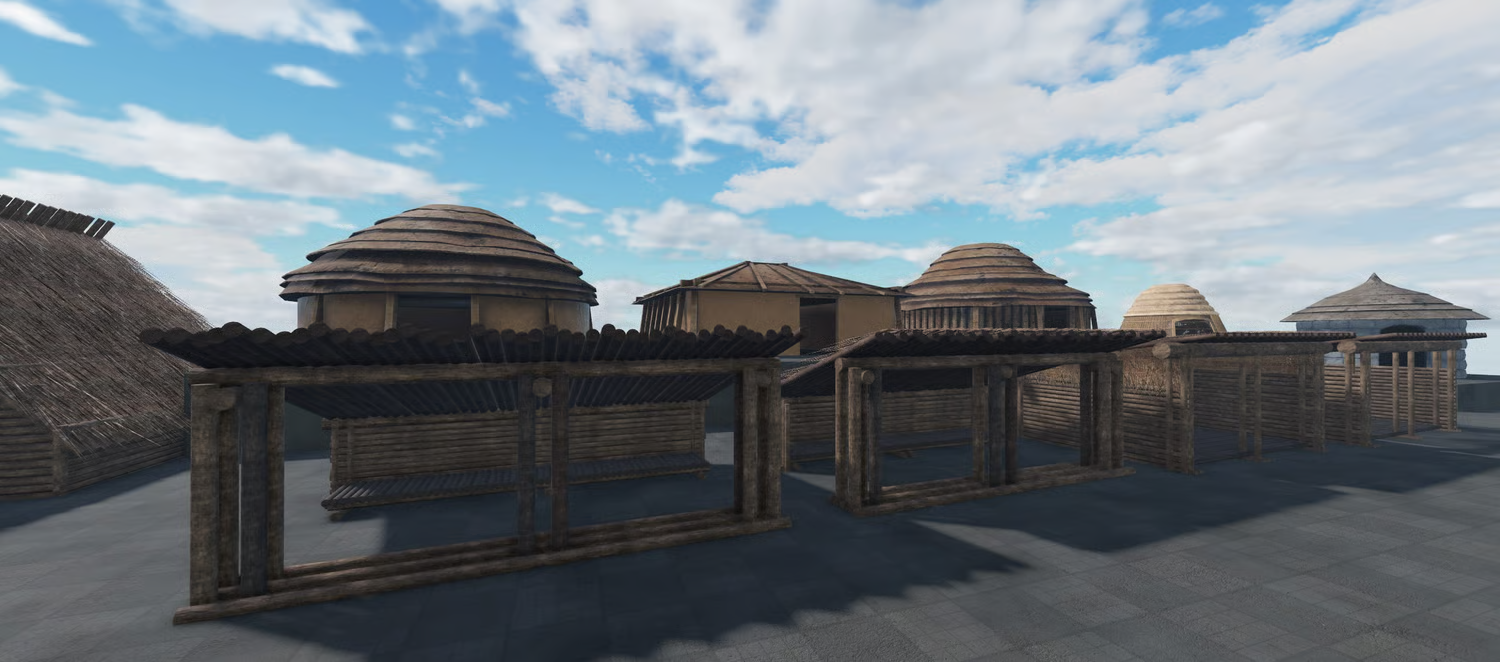 Primitive spear racks displaying wooden and stone weapons