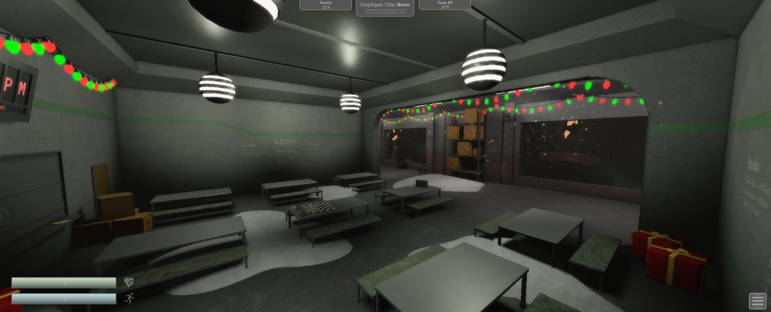 Cafeteria interior with tables and festive lights