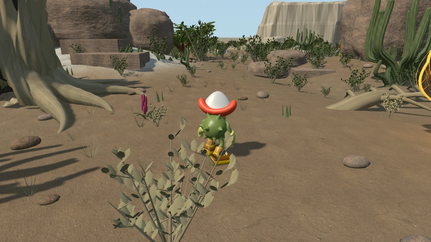 CARU enters a sunlit KAA-TINGA path between rock walls, shrubs and cacti.