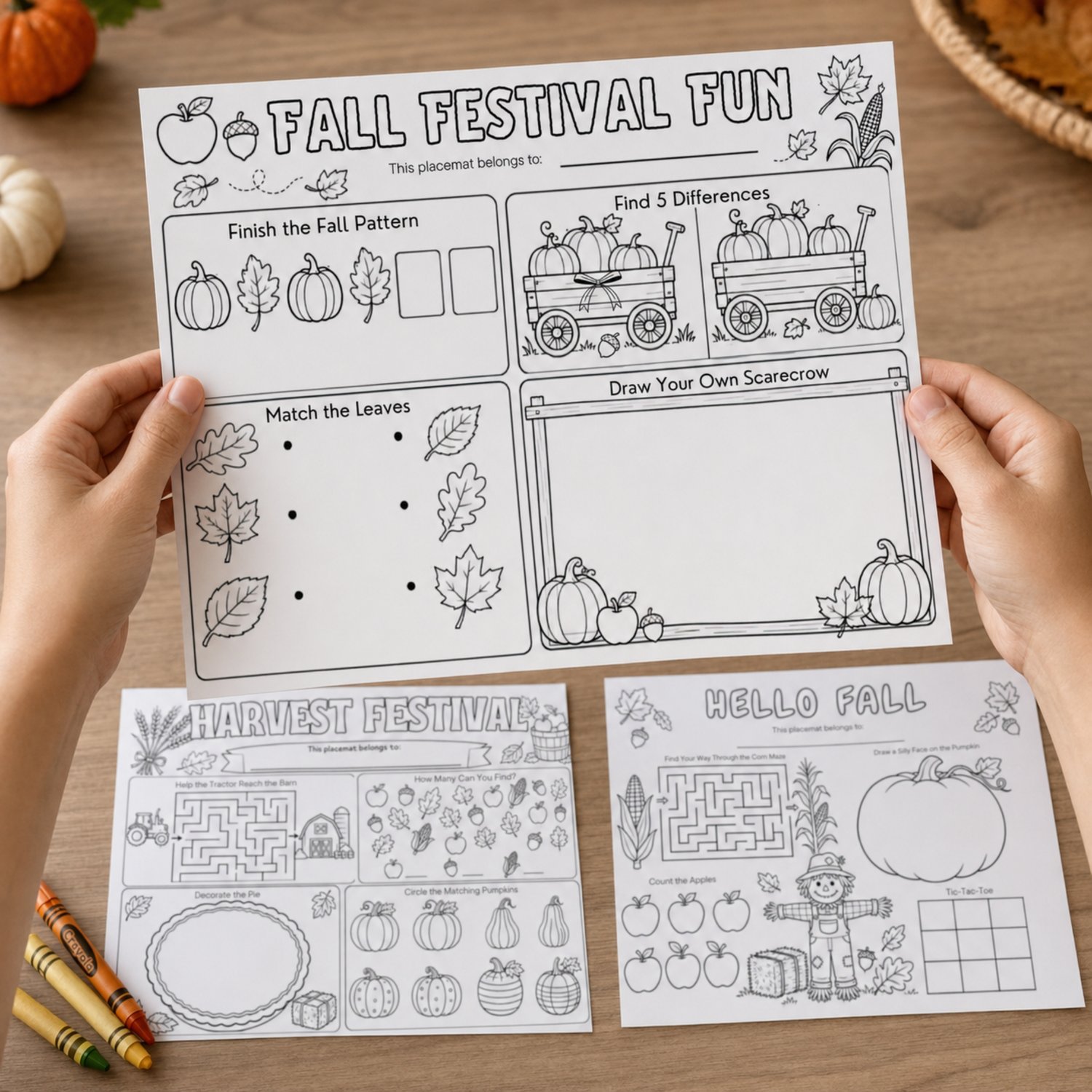 Three black-and-white printable fall activity placemats for children featuring pumpkins, apples, leaves, corn, scarecrows, tractors, mazes, coloring prompts, matching games and tic-tac-toe.