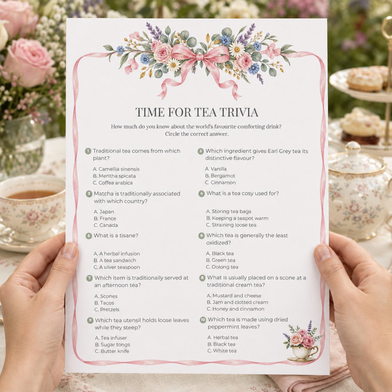 Printable Garden Tea Party Trivia Game with 10 multiple-choice tea questions, watercolor pink ribbon and English garden flowers, floral teacup and answer sheet.