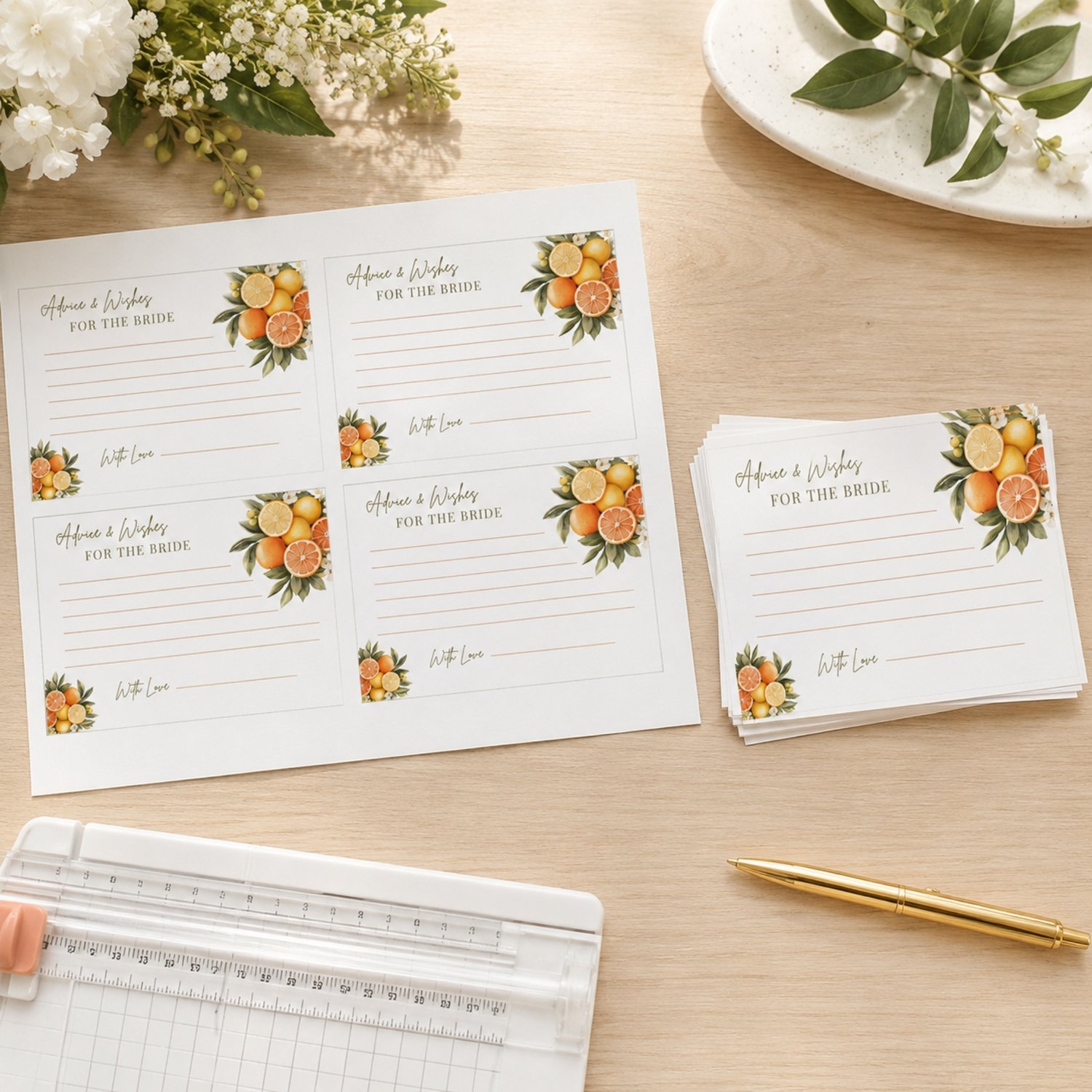 Printable citrus Advice and Wishes for the Bride cards featuring lemons, oranges, white blossoms and green leaves, with four 5 by 3.5-inch cards arranged on a landscape US Letter page.