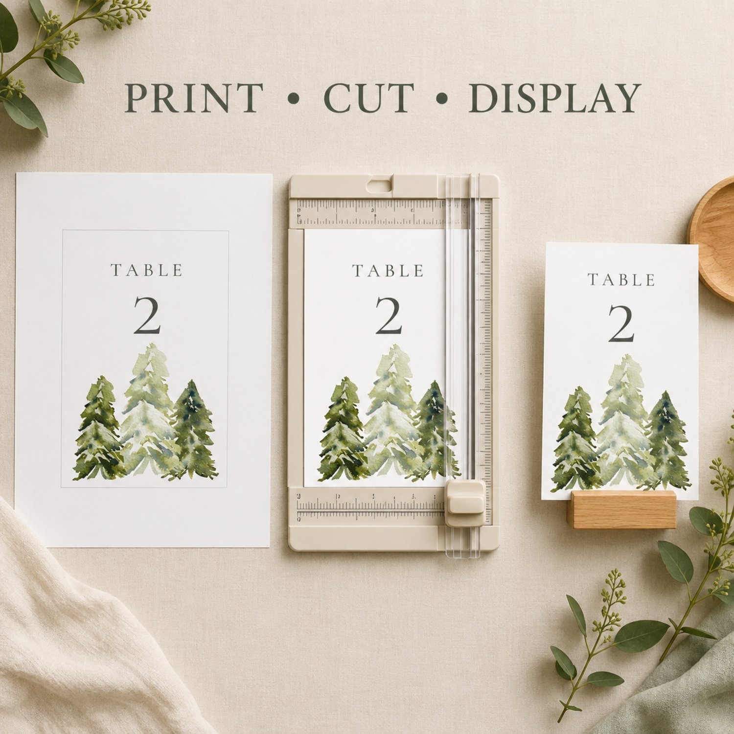 Editable 5 × 7-inch watercolor pine tree table number card featuring soft green woodland trees, elegant charcoal lettering and table numbers 1–30 for rustic, forest, mountain or outdoor weddings.