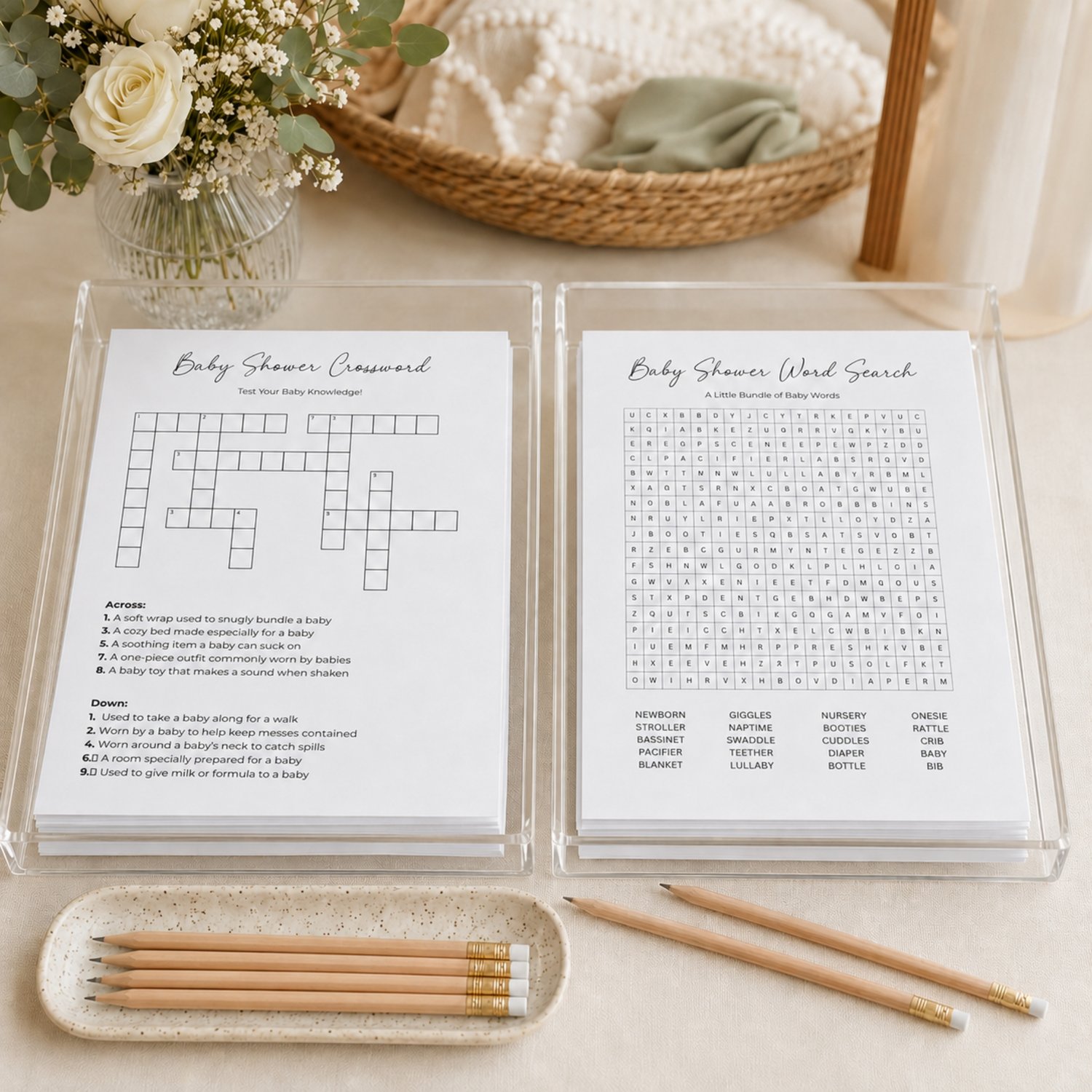 Printable baby shower game bundle featuring a Baby Shower Word Search with 20 baby-related words and a Baby Shower Crossword Puzzle with answer keys, formatted as four black-and-white US Letter pages.