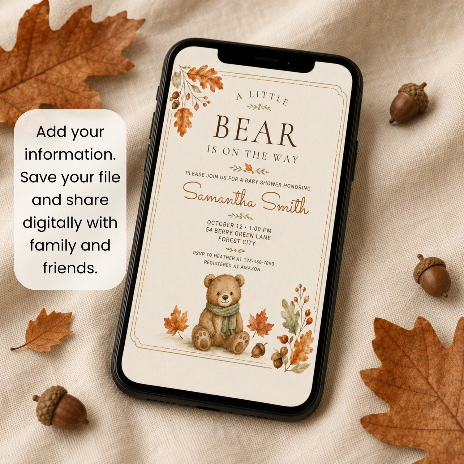 Editable 5 by 7 fall baby shower invitation featuring a watercolor teddy bear in a green scarf, autumn leaves and acorns with “A Little Bear Is on the Way” wording.