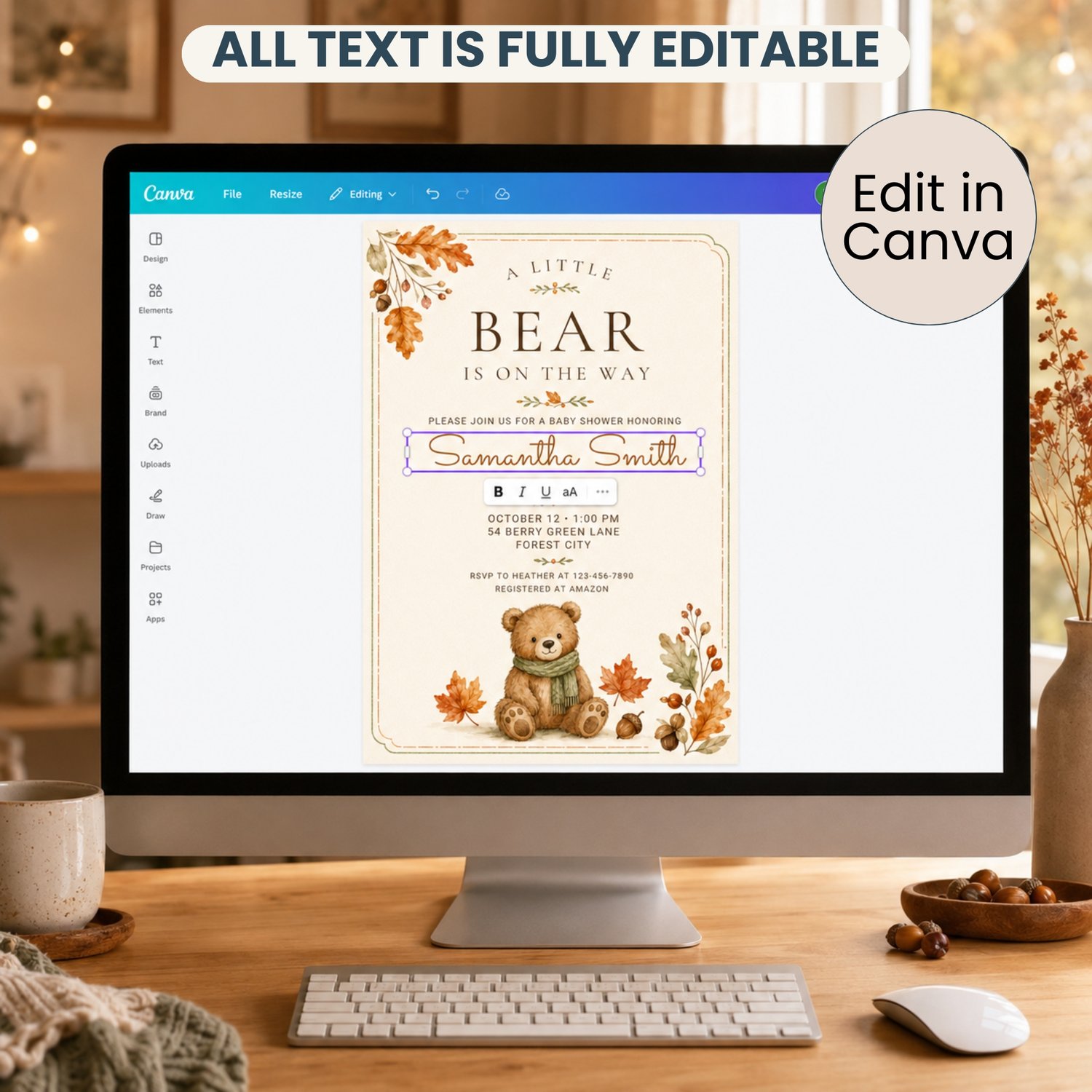 Editable 5 by 7 fall baby shower invitation featuring a watercolor teddy bear in a green scarf, autumn leaves and acorns with “A Little Bear Is on the Way” wording.