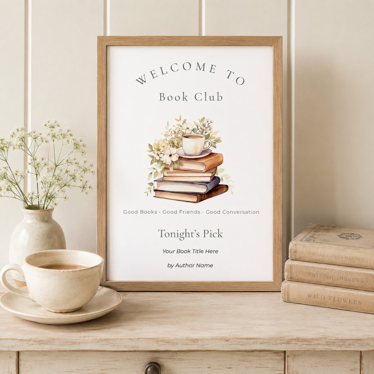 Editable 8 x 10-inch Book Club Welcome Sign featuring watercolor books, cream flowers, green leaves and a tea cup, with customizable spaces for the featured book title and author.
