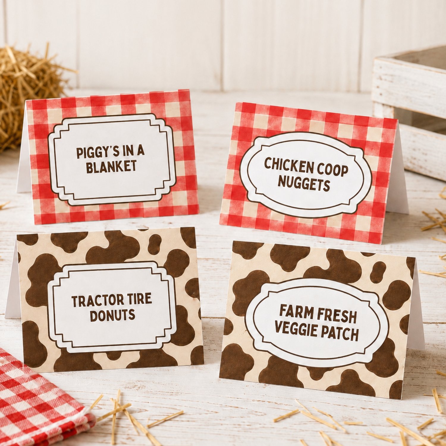 Four editable barnyard birthday folded food-label cards featuring red gingham and brown cow-print patterns with sample farm-themed food names, arranged on a printable letter-size sheet.