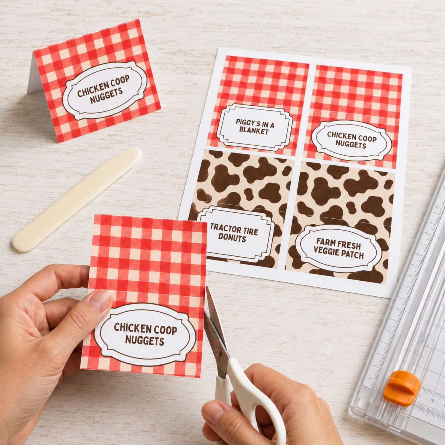 Four editable barnyard birthday folded food-label cards featuring red gingham and brown cow-print patterns with sample farm-themed food names, arranged on a printable letter-size sheet.