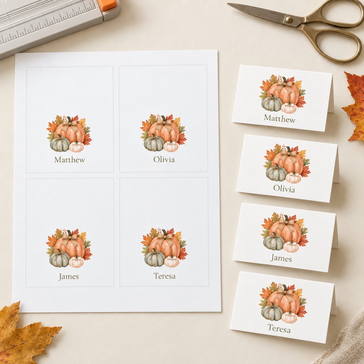 Editable fall place card templates featuring watercolor orange, sage and cream pumpkins with rustic bows and autumn leaves. Includes printable flat and folded tent name cards for Thanksgiving dinners, Friendsgiving and fall celebrations.