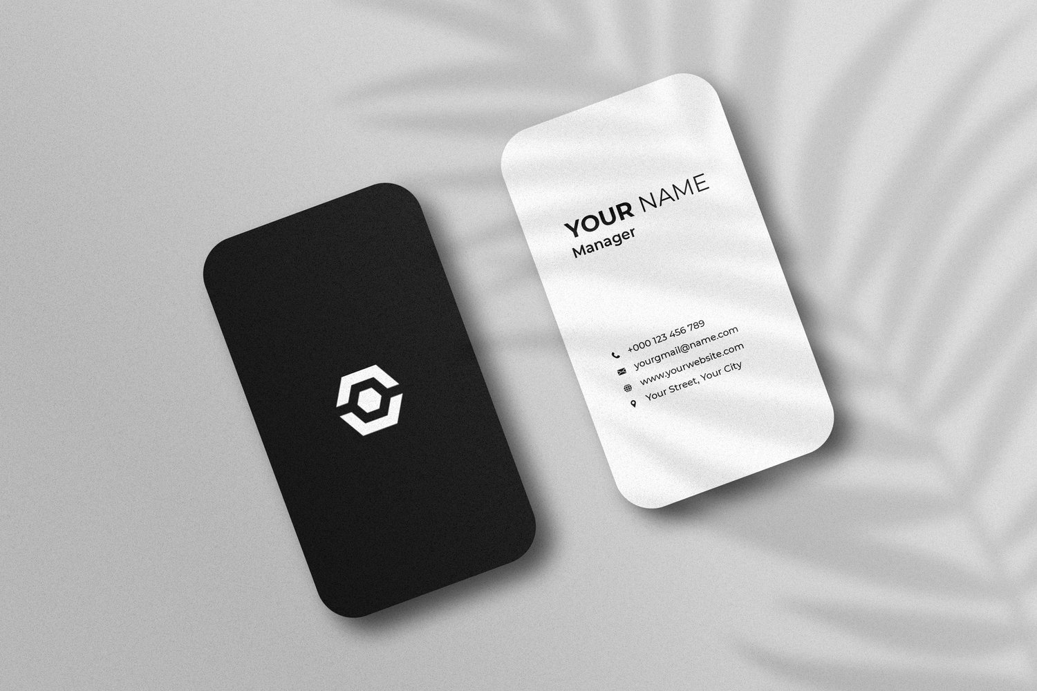 Top angle view of business card mockup with shadow from graphicsregion