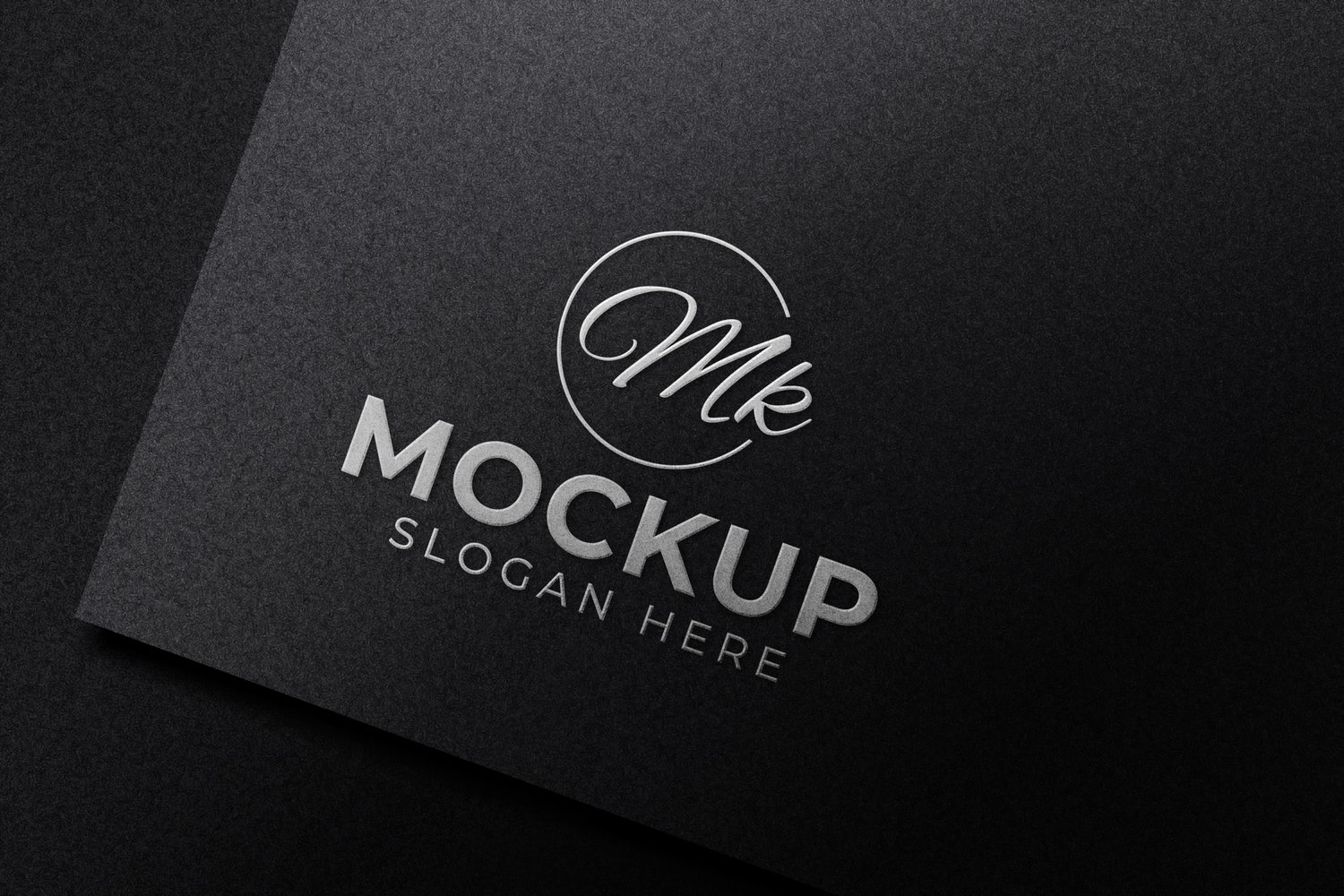 Luxury embossed silver logo mockup on black paper from graphicsregion