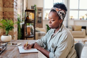 Black woman writing