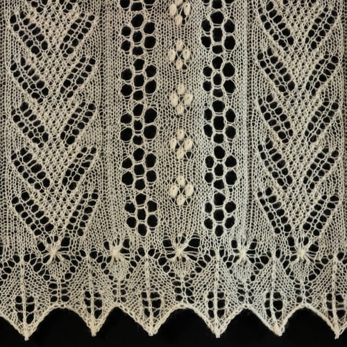 Knitted lace from the Grain Field Stole Pattern.