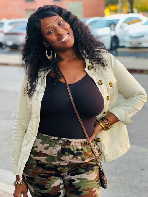 African American woman in army pants