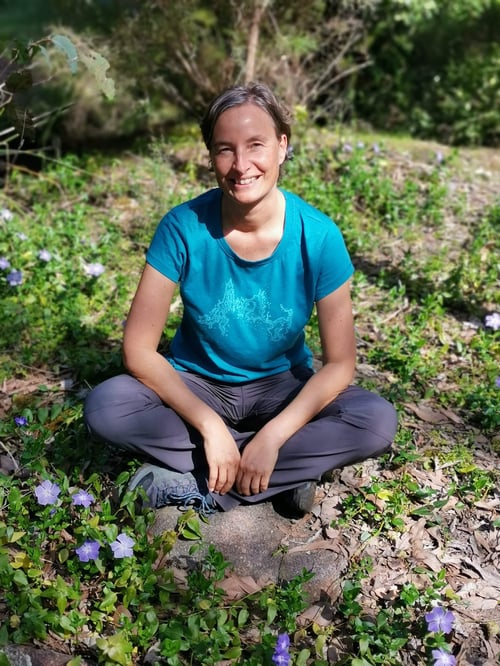 person sitting in nature