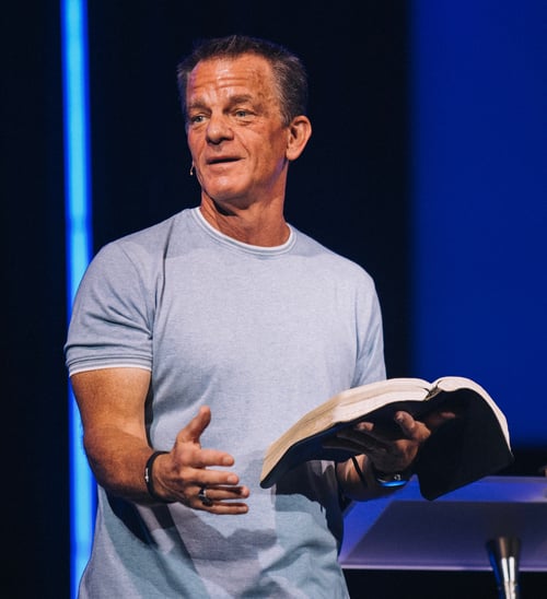 Art Evans holding the Bible