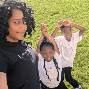 Image of woman and two children