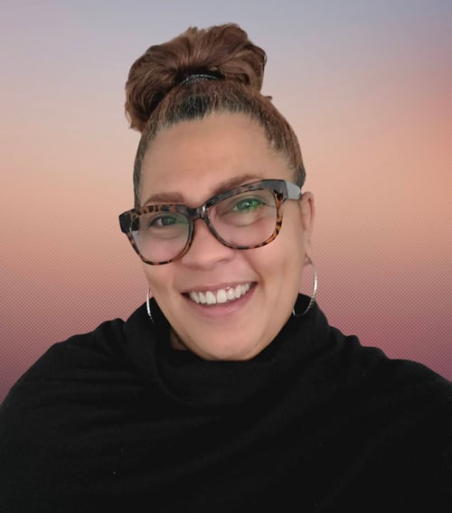 Headshot picture with glasses and black top