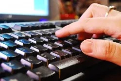 Cassandra's hand on a keyboard