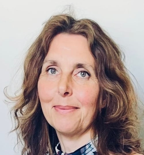 Photo of the founder of High Vibe Rituals a middle-aged womans friendly face.