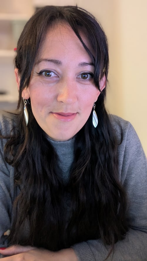 Photo of Hannah looking at the camera, smiling