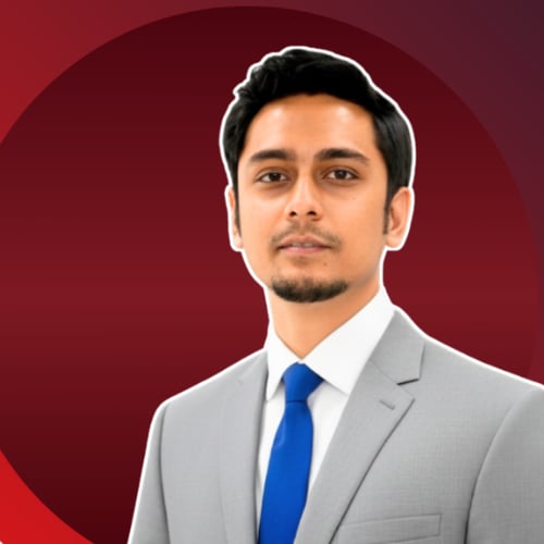 Galib, creator of The Galib Groove, professional face shot in suit on dark background for Canva templates store.