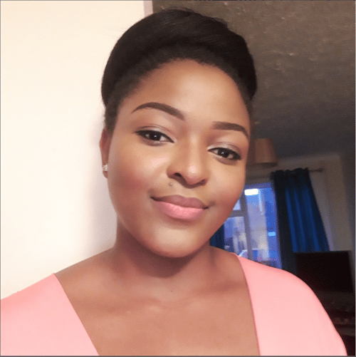 Portrait of Carine, owner and luxury cake designer behind CarineStarBakes, a Norfolk-based bespoke cake studio specialising in handcrafted celebration and wedding cakes.