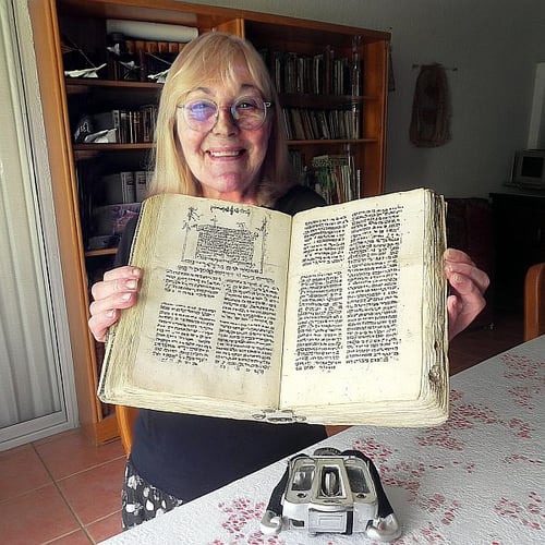 my portrait holding an antique book