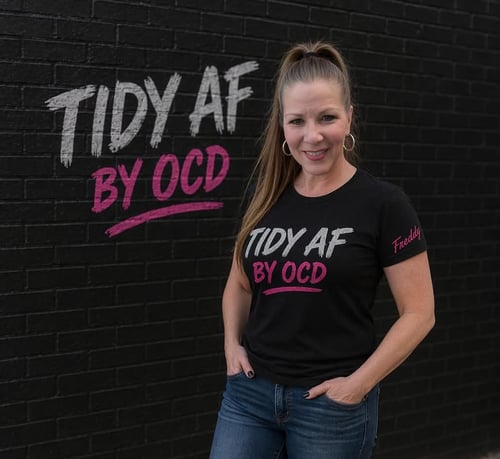 Tidy AF by OCD founder Cyndi promoting garage reset and decluttering systems.
