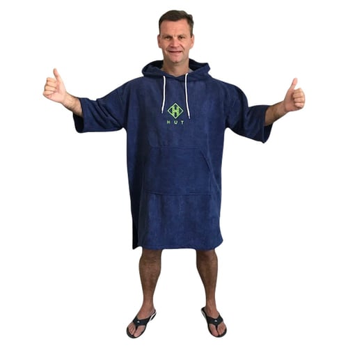 Person wearing a dark blue towel poncho facing front