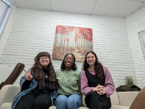 Rae, Mellany, and Madison sitting on couch