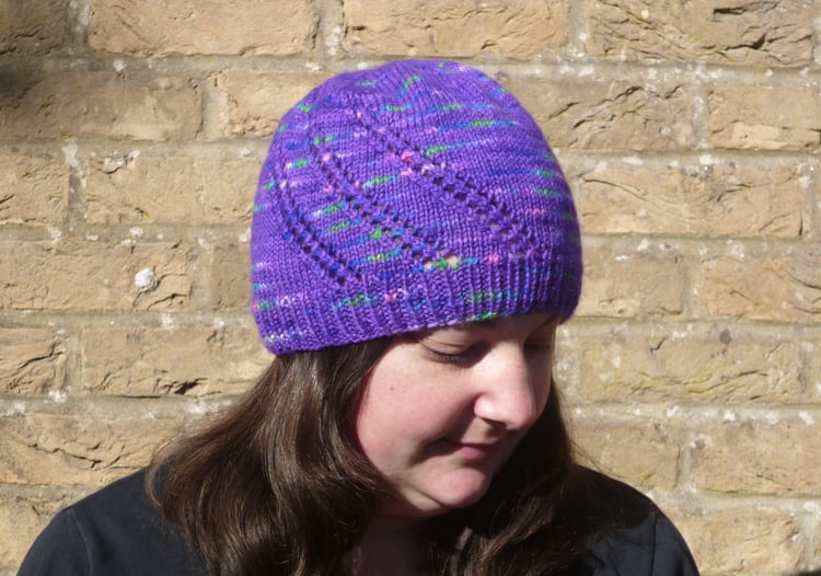 Northern Lights knitted hat worn by UK knit designer, Su Sayer.