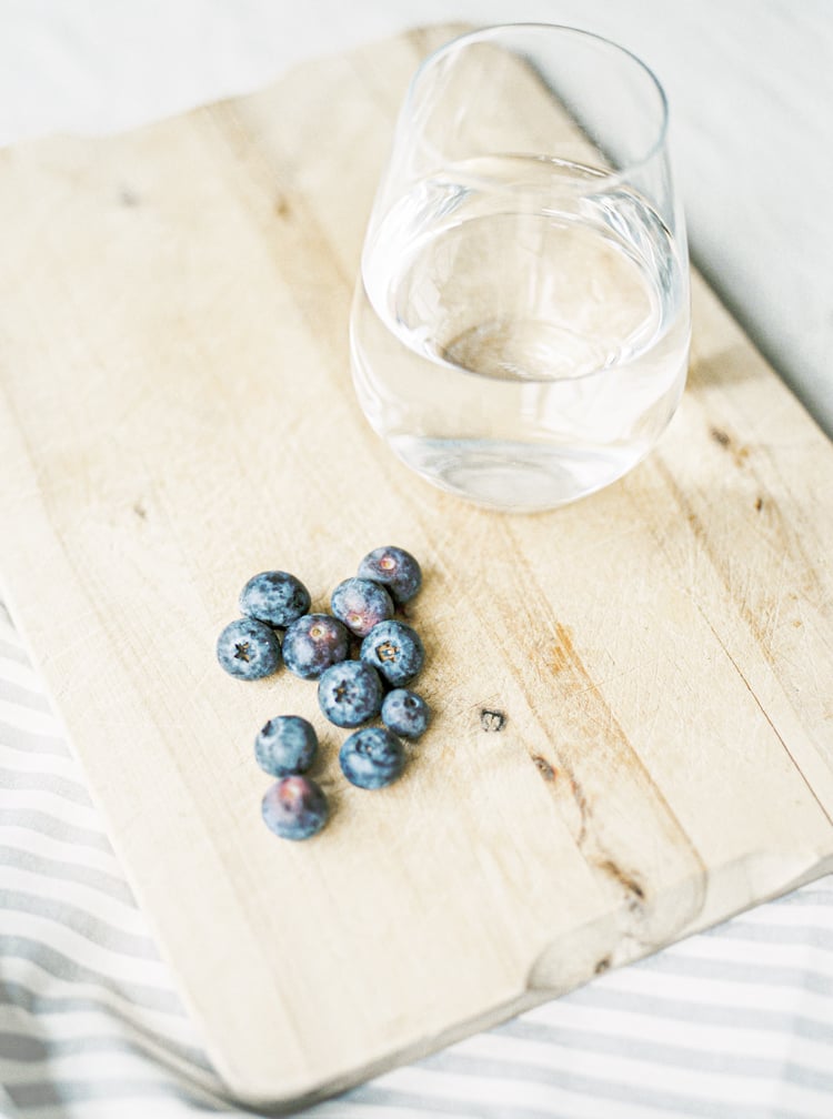 blueberries and a glass of water