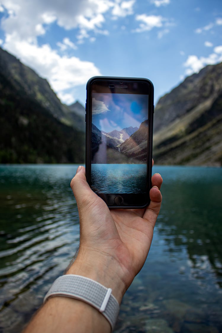 A photo of a waterfall on a person's cell phone.