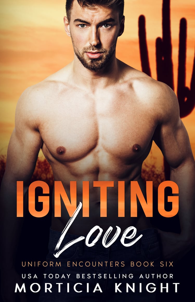 Igniting Love by Morticia Knight BOok Cover featuring a handsome young shirtless man at sunset in the desert.