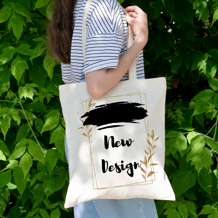 a woman in a striped shirt with a cloth bag over her shoulder