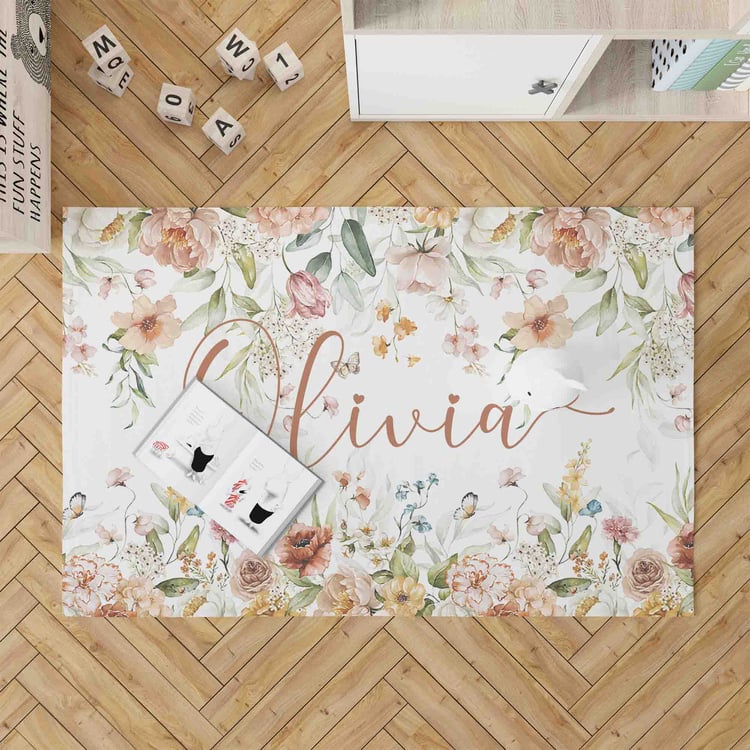 Transform your living room with a stunning floral custom name rug. This unique piece will add a touch of elegance and personality to your space.